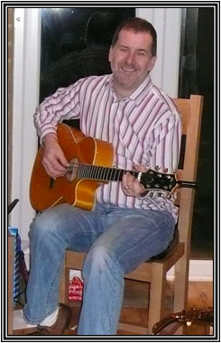 Barry playing at a house gig